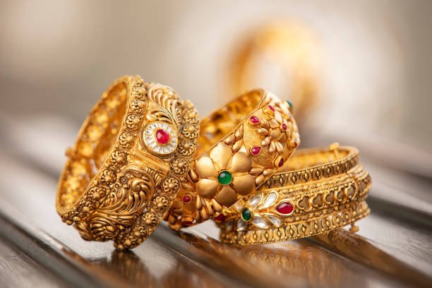 fancy designer antique golden bracelets for woman fashion studio shot. fancy designer antique golden bracelets for woman fashion studio shot.